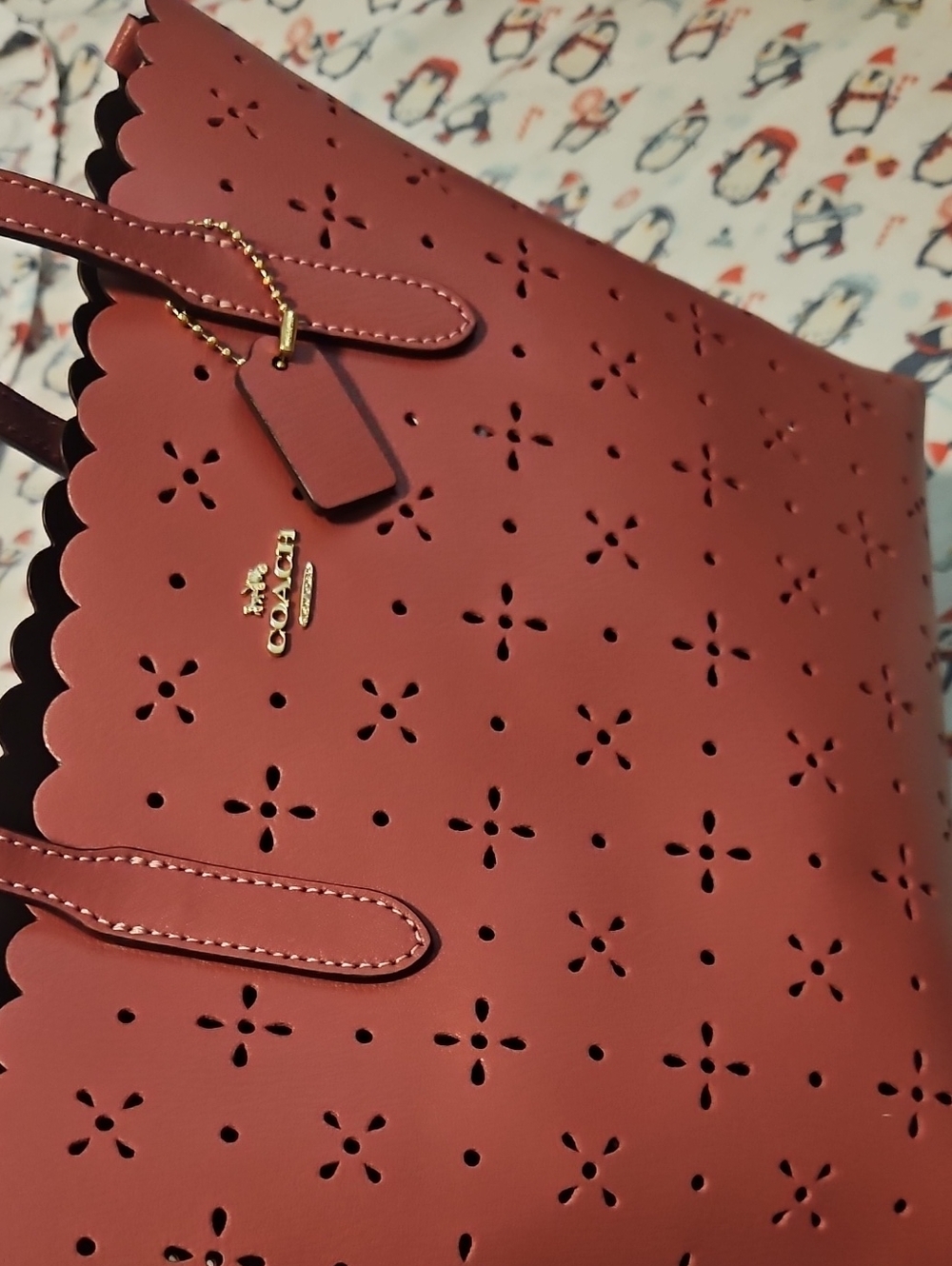 Coach Scalloped Floral Perforated Tote in Brick Red